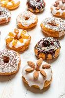 Group of colored glazed donuts photo