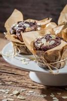 Plate full of chocolate muffins with almonds
