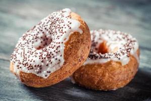 Closeup of donuts with chocolate glaze photo
