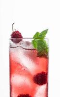 Red cocktail with raspberry
