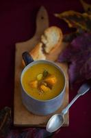 Pumpkin soup in a cup.