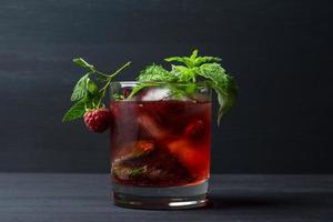 Cocktail with raspberry and mint photo
