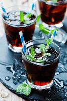 Cuba libre with ice and mint