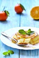 Curd souffle with orange and vanilla. photo