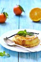 Curd souffle with orange and vanilla. photo