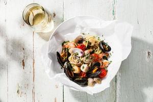 Seafood pasta and wine