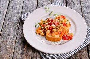 Bruschetta with vegetables and beans photo