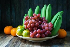close up shot of  fruits on wooden table. photo