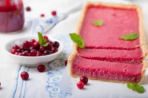 Cranberry, bilberry custard tart, pie,cake with fresh berries photo