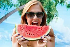 Woman Eating Watermelon photo