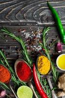 Spices over wooden background photo