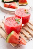 Fresh watermelon juice in the glass.Selective focus on the front