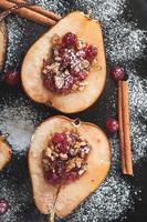 Baked pears with cranberries, honey and walnuts photo