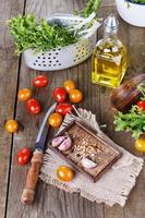 Salad ingredients on a rustic wooden background photo