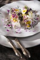 Goat cheese with edible flowers