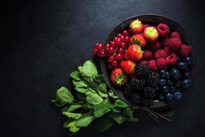 Fresh berries in bowl, antioxidant concept
