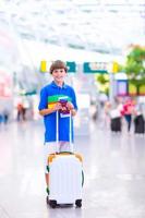 Boy traveling by airplane photo