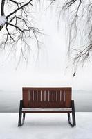 Empty bench in the snow, West Lake, Hangzhou photo