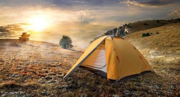 Tent on mountain photo