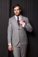 Elegant man in grey suit