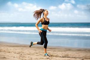 Female runner jogging photo