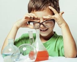 little cute boy with medicine glass isolated
