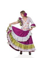 Spanish girl dressed in traditional costume Andalusian dancing photo