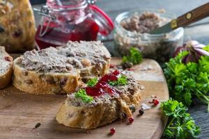chicken liver or goose pate on wholegrain bread and cranberry