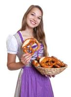 Blond woman in a purple dress loves pretzels photo