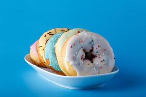 Donuts on saucer photo