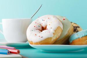 Donuts on saucers photo