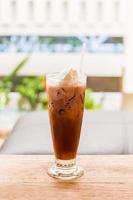 Ice coffee with whipped cream . photo
