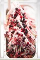 classic italian berry gelato ice cream in shop display photo