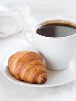 Croissant with coffee photo