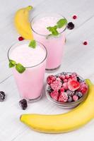 Frozen summer berries milkshakes photo