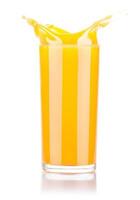 Fresh orange juice in glass with splash photo