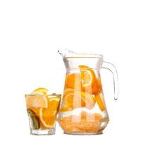 pitcher with a refreshing drink with lemon slices photo