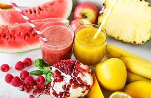 Fresh organic red and yellow smoothie with apple, watermelon
