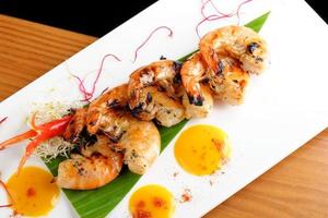 Thai fine dining/ Fresh cilantro marinated “Black Tiger” shrimps photo