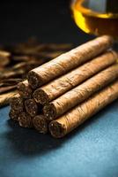 pile of authentic cuban cigars photo