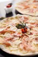 Italian pizza with tomato photo