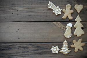 Decorated Ginger Bread Cookies on Wooden Plank