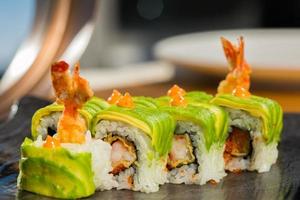 Organic sushi roll with  shrimp tempura at restaurant