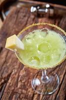 Green margarita melon cocktail photo