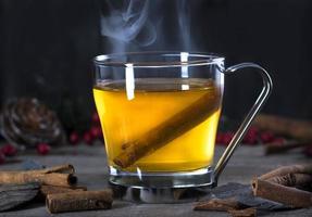 Hot Toddy Cocktail Drink with Cinnamon photo