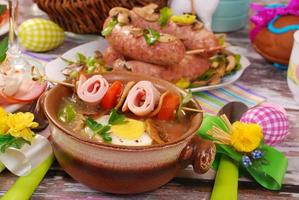 white borscht with rolled ham on skewer for easter