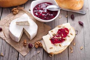 bread served with camembert and cranberry.