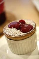 Souffle with Raspberry topping ready to eat photo
