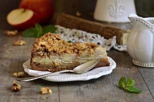 Apple pie with walnut and sugar glaze.