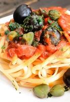 linguine pasta olive and capers photo